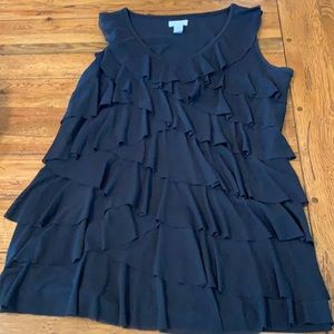Chico’s sleeveless black ruffled top.